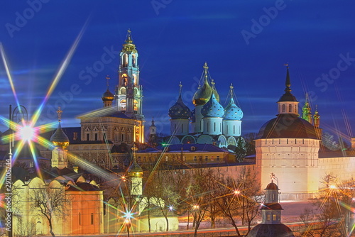 Troitse Sergieva lavra church in Sergiev Posad Moscow area, close up winter night view from observation deck with 8-ray filter