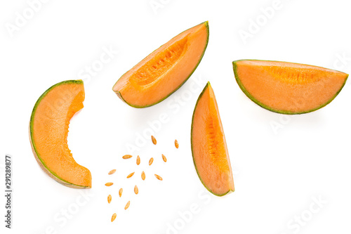 Melon Creative Layout. Fresh sliced cantaloupe Melon fruit isolated on white background. Flat lay. Top view