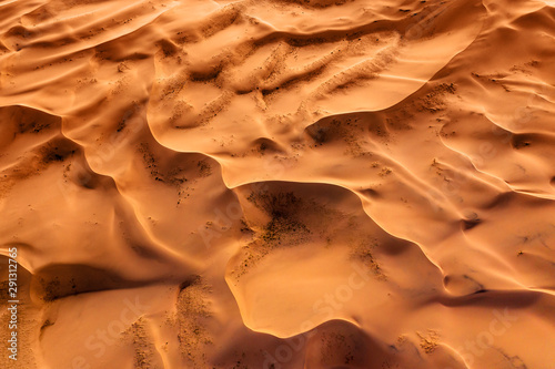 Aerial top view on sand dunes in desert