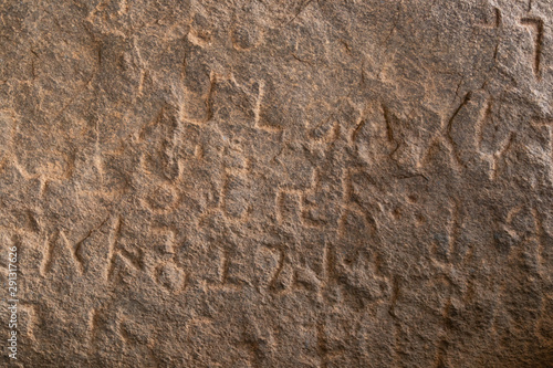Close up of Inscriptions of Emperor Ashoka on rock boulder at Maski, Raichur, India