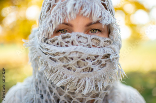 Arabian woman wrapped in yashmak closeup portrait.