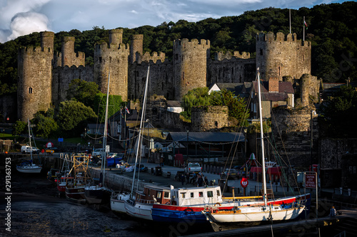 Conwy, Wales, United Kingdom - August 16, 2019: World heritage Conway castle in Wales in late afternoon