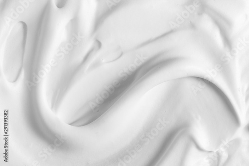 White thick foam texture background. Cream, mousse, cleanser, shaving foam, shampoo. Foamy skin care product
