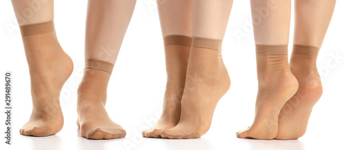 Set female legs in nylon socks on white background isolation