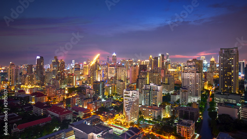 night cityscape lighting up and twilight skyline in metropolis