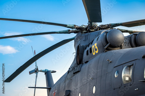 Military heavy helicopter, army air means of transport, air force, aviation and aerospace industry, dark gray big copter with rotor