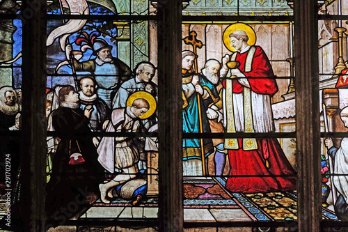 St. Aloysius Gonzaga receiving first communion from the hands of Saint Charles Borromeo, stained glass window in Saint Severin church in Paris, France