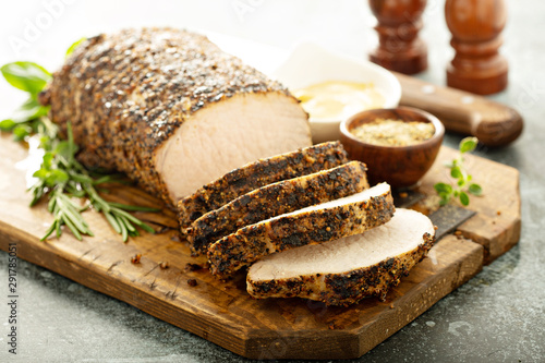 Roasted pork loin with a spicy rub and mustard sauce