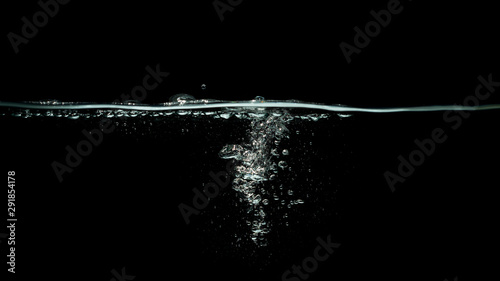 water splash isolated on dark black background
