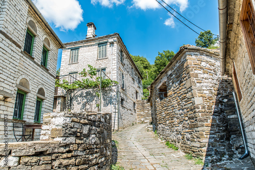 Traditional alley in Mikro Papingo village in Ioannina during summer, Greece