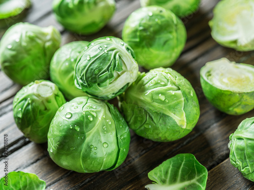 Brussel sprouts on the old wooden table.