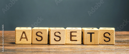 Wooden blocks with the word Assets. Resource owned by the business. Financial accounting. Money and finance. Cash equivalents, certificates of deposit