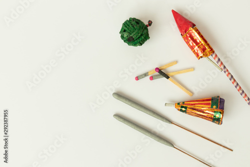 Different types of Diwali Firecrackers on isolated background with copy space.