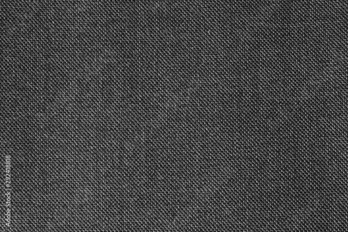 Black and white background. Woven fabric texture. Closeup