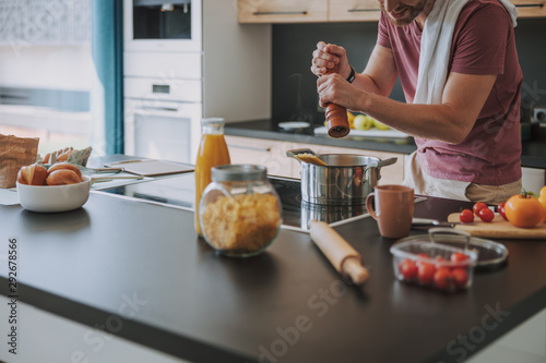 Cook preparing an Italian dinner at his kitchen