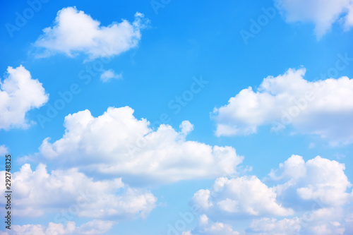 Blue sky with white cumulus clouds