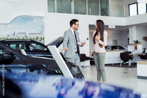 Customer buying a vehicle at car dealership