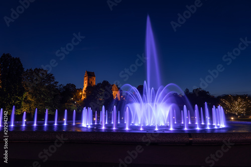 Park Fountain Illuminated at Night in Warsaw