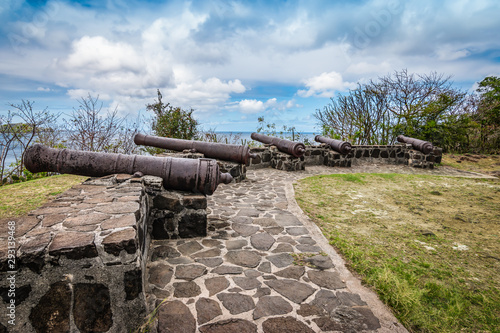 Medieval cannons on the hilltop of Fort Hamilton on Bequia Island, St Vincent and the Grenadines, Lesser Antilles, Caribbean.