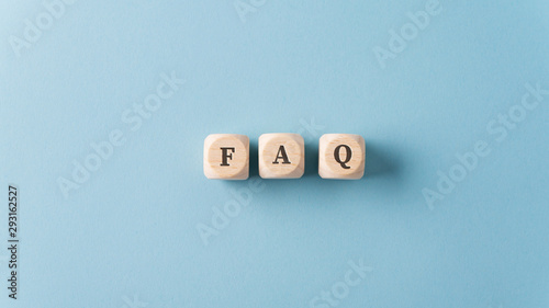 FAQ sign over light blue background