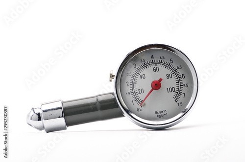 Pressure gauge for measuring air pressure in car tires on a white background