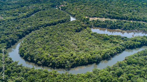 Aerial view of a meandering Amazon tributary river, Amazonian rainforest, San Jose do Rio Claro, Mato Grosso