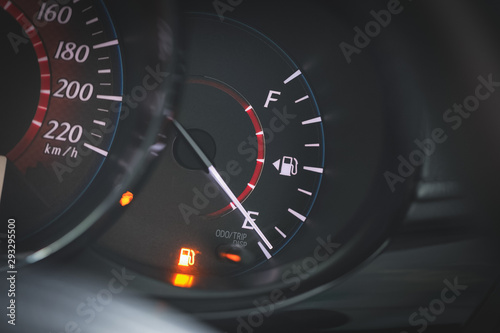 Low Fuel gauge showing fuel dashboard.