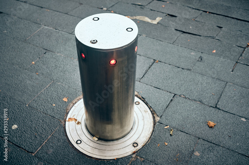 bollards can be retracted into the roadway to allow traffic