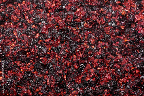 Pressed grape pomace, seeds and skins. Winemaking background.