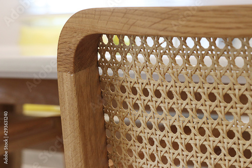 Closeup of wood chair with rattan, Beautiful oak wood texture surface , rattan pattern.