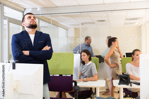 Thoughtful man in modern office