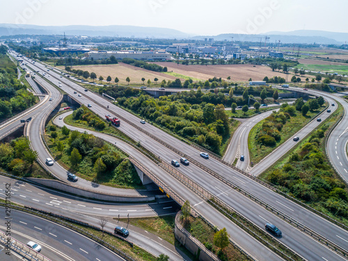 Aerial view of a highway intersection with a clover-leaf interchange Germany Koblenz