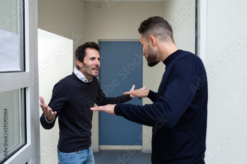 Two Men Quarreling With Each Other