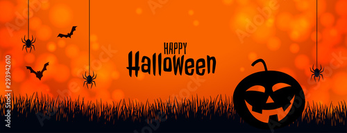 orange halloween banner with pumpkin spider and bats
