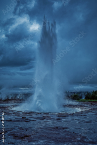 Amazing shot of erupting strokkur geyser, located in a geothermal area beside the Hvita River