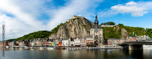 panorama view of the small town of Dinant on the Maas river with the historic citadel and cathedral on the river front