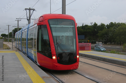 Red tram arriving
