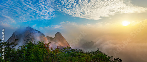 Panorama of Bukhansan National Park with Clouds and fog at Sunrise in Seoul South Korea