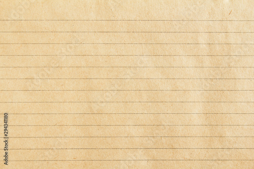 Brown lined craft notebook paper texture background.