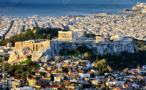 Aerial view over Athens with te Acropolis and harbour from Lycabettus hill, Greece at sunrise