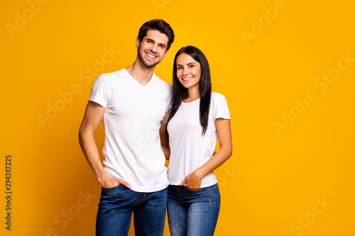 Photo of nice couple hugging ready for first working day reliable people wear casual clothes isolated yellow color background