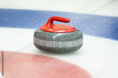 Curling rock on the ice