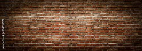 Old wall background with stained aged bricks