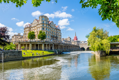 The Pulteney Bridge in Palladian style crosses the River Avon in Bath