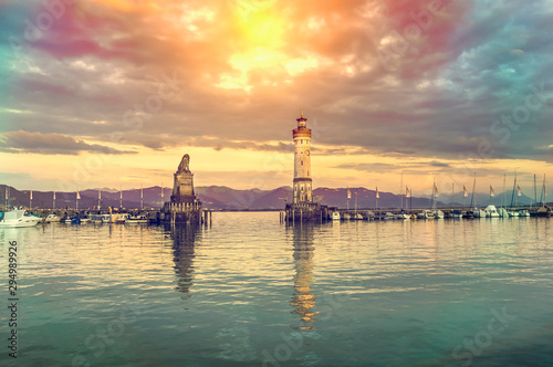Beautiful evening seascape with lighthouse in harbor of Lindau