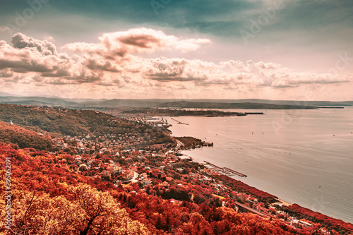 Aerial view of the beautiful city of Trieste in Italy, moody sunset