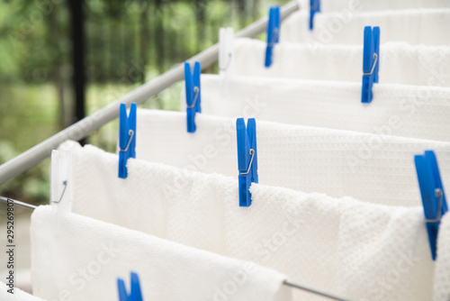 White towels drying on clotheshorse