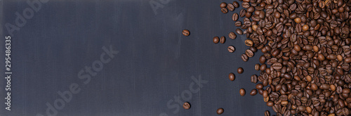 Coffee beans on navy painted background