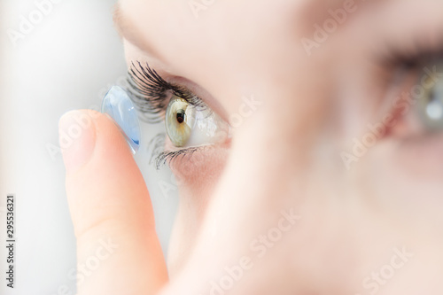 girl wearing soft contact lenses close-up macro