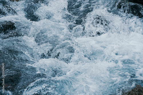 Rough water of sea surf. The water boils in rapid flow of river